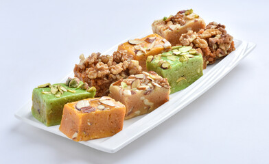 Mix Halwa, A delicious collection of different healthy traditional sweets, made by desi ghee (butter oil), dry fruits and milk.