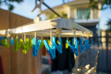 Plastic clothes peg on the clothesline