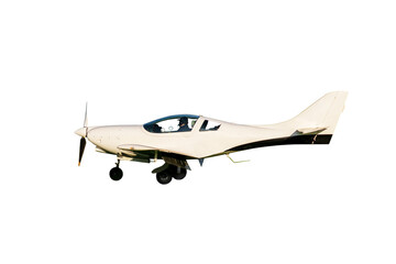 A small plane with a pilot in the cabin.