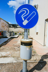 Fototapeta premium smoking area blue sign. Designated smoking area