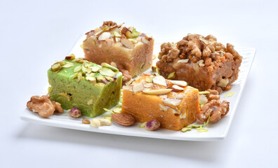 Mix Halwa, A delicious collection of different healthy traditional sweets, made by desi ghee (butter oil), dry fruits and milk.