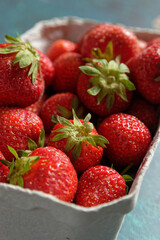 Close up of strawberries in cardboard box