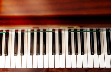 Close-up, piano keys, top view, flat lay. Background, cover for poster or banner