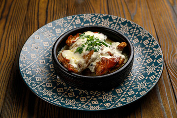Georgian cuisine. Wonderful dishes on a wooden table

