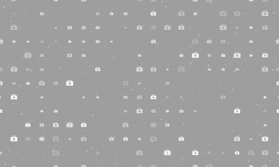 Seamless background pattern of evenly spaced white first aid symbols of different sizes and opacity. Vector illustration on gray background with stars