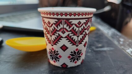 A flower paint on the wall, coffee texture background 