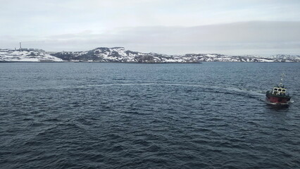 Northern landscapes. Kola river and winter hills. Kola Bay, Murmansk.