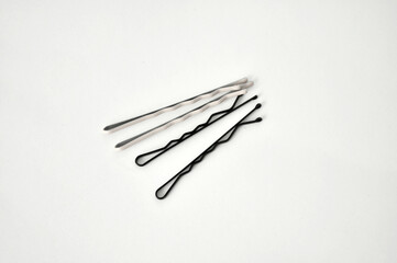 invisible hair clip white and black on a white background