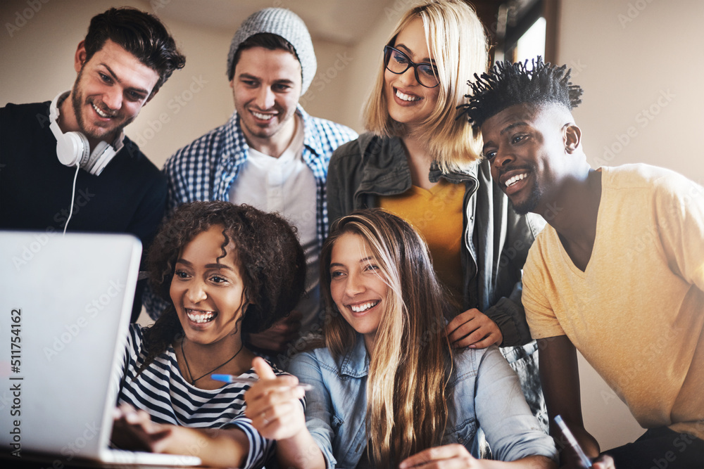 Fototapete laughter in between studying helps us stay focused. cropped shot of a group of university students w