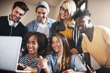 Laughter in between studying helps us stay focused. Cropped shot of a group of university students...