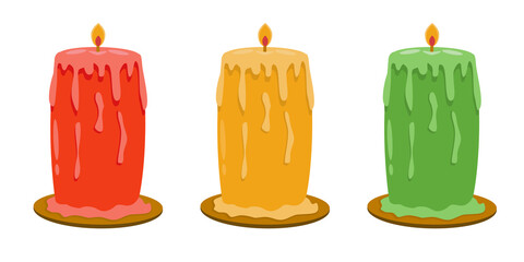 A set of bright autumn thick candles for the home in yellow, red and green in a flat style. Vector image.