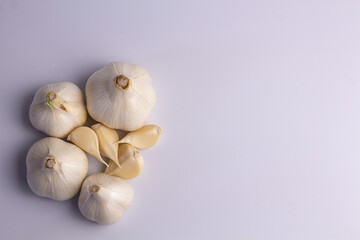 garlic on a white background, spicy spices