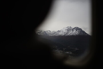the photo captures the moment of takeoff and flight by plane over Ushuaia &mdash; a city and port in southern Argentina.
