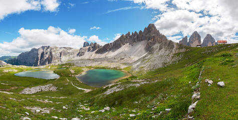 Beautiful mountain panorama in Dolomites mountains by Tre Cime di Lavaredo - obrazy, fototapety, plakaty
