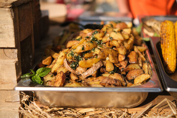 Fried potatoes. Young potatoes are fried in a frying pan. Toasted crispy crust