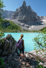 Female hiking in the Dolomites mountains