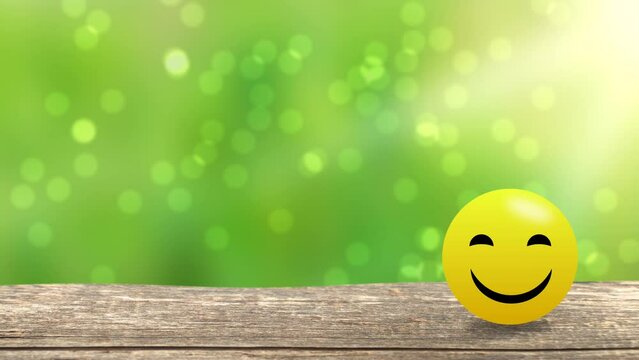 Taste emoji with moving toung on wooden desk and blur background. 
Food, taste and flavours concept clip.
