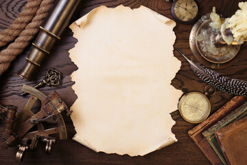 An old paper scroll on the captain's desk. Adventure and travel concept