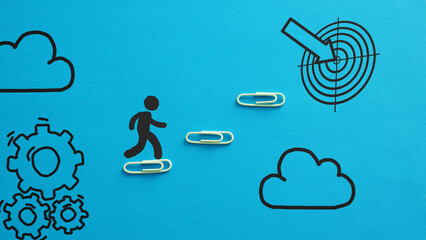 Career development. Businessman stepping up a staircase