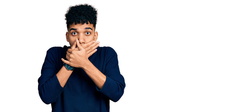 Young african american man wearing casual clothes shocked covering mouth with hands for mistake. secret concept.