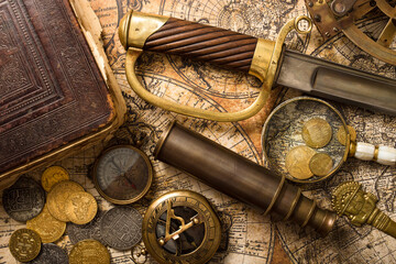 Vintage still life in adventure style. Pirates gold coins treasure. - obrazy, fototapety, plakaty
