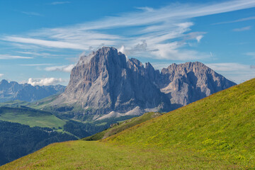 Dolomites mountains on a summer day, perfect for hiking and trekking over the forest paths. 