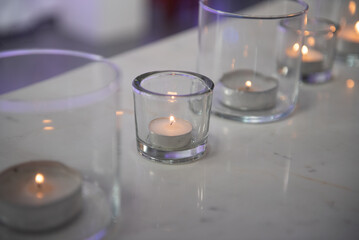 Candle light glowing in jar glass for romantic atmosphere