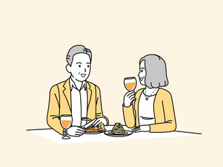 外食をする中年の夫婦　ミドル　食事　レストラン　飲食