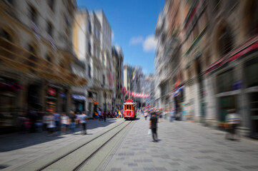 Nostalgic retro red tram on famous Istiklal street.