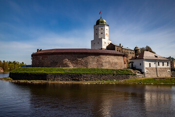 Vyborg Castle. Medieval fortress in Vyborg. Castle on the water.