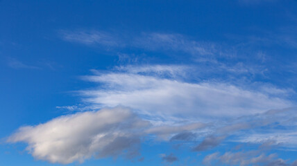 Naklejka na ściany i meble blue sky with white clouds on a Sunny summer day