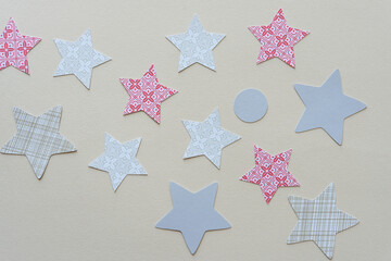 paper star and circle shapes on blank paper