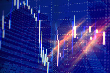 Multiple exposures of high-rise business building and stock chart with orange flash light. Concept images of bear and bull stock market. 