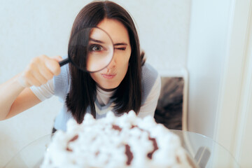 Funny Woman Examining a Birthday Cake with Magnifying Glass  - obrazy, fototapety, plakaty