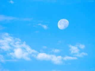 Naklejka na ściany i meble blue sky with the moon and clouds