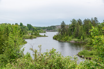 A picturesque lake sits nestled among the trees along the Heritage Silver Trail in the small mining town of Cobalt, Ontario.
