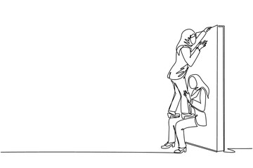 Single continuous line drawing Arabian businesswoman helping to lift another businesswoman over brick wall. Help, assistance and team concept. Business metaphor. One line draw graphic design vector