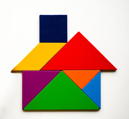 model of  House Made Of Wooden  Tangram Puzzle. isolated on white background. Colorful tangram as...