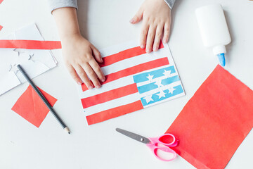 Step-by-step instruction. Child makes a postcard to the 4th of July. Patriotic holiday. Process kid...