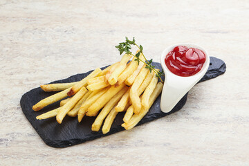 French fried potato over board