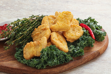 Crispy chicken nuggets with tomato ketchup