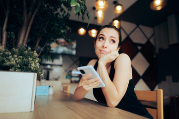 
Annoyed Woman Waiting for her Date in a Restaurant. Funny girl feeling bored using a dating app...