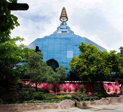 Ancient ubosot church and classic modern architecture building for thai people travelers travel visit and respect praying blessing holy mystery worship at Wat Sangkhatan temple in Nonthaburi, Thailand