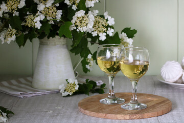 two glasses of white wine.