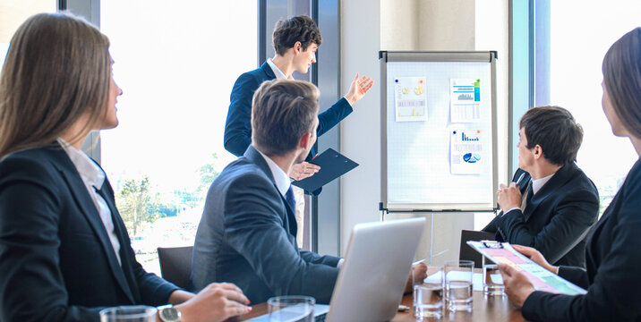 business conference presentation with team training flipchart office