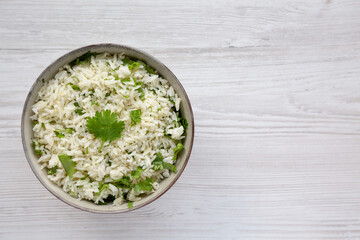 Homemade Cilantro Lime Rice in a Bowl, top view. Flat lay, overhead, from above. Copy space.