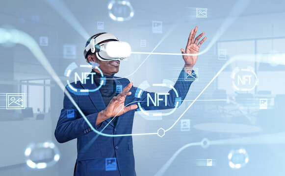 African businessman in vr glasses, NFT icons with lines hologram