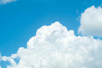 Naklejka na ściany i meble Blue sky background with clouds.