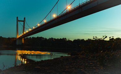 Bridge over the river. Bridge with lights over the Danube, photographed at night.