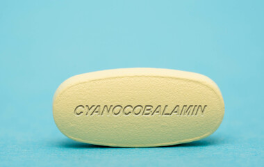Obraz na płótnie Canvas Cyanocobalamin Pharmaceutical medicine pills tablet Copy space. Medical concepts.